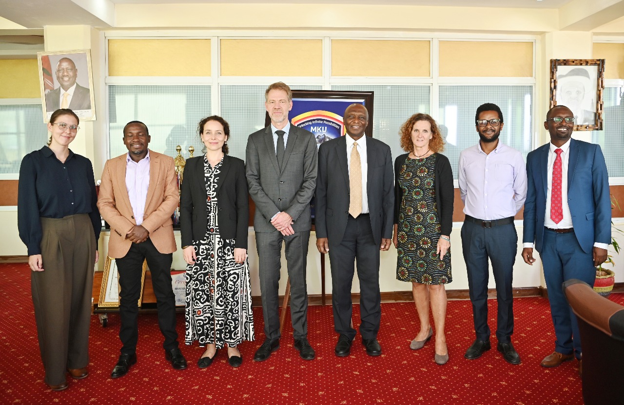 The German delegation led by Deputy Ambassador to Kenya Mr Alexander Fierley (4th left) poses with the MKU faculty and team led by VC Prof Deogratius Jaganyi (fourth from right) during a visit by a high powered delegation from the German embassy in Nairobi to MKU Thika Campus.